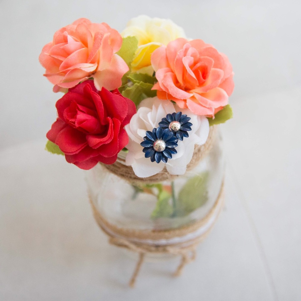 Blue and silver flower stud earrings